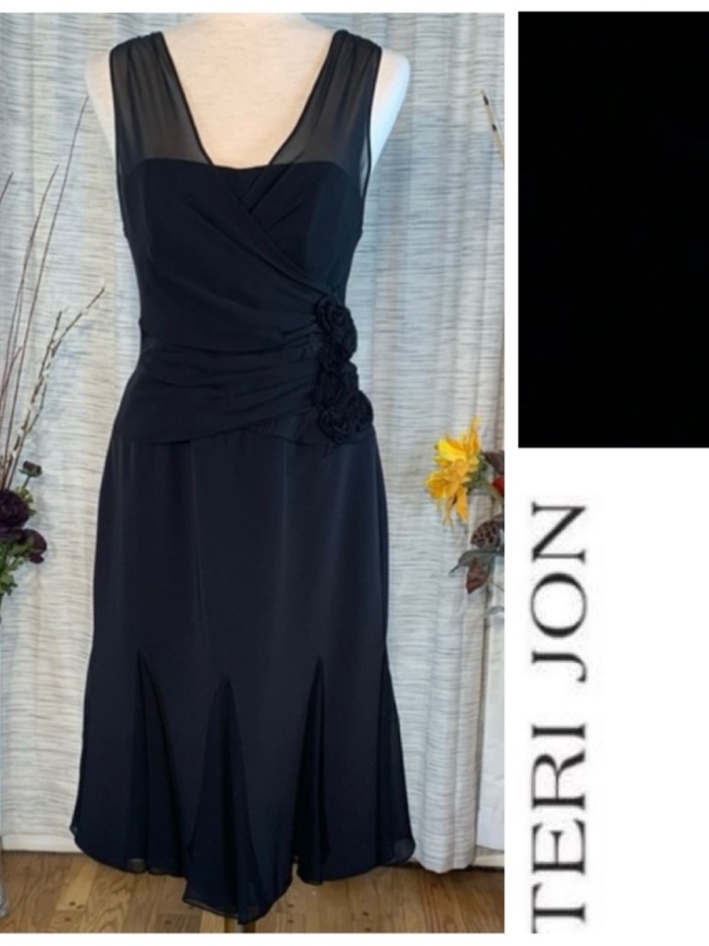 Rickie Freeman Teri Jon black sleeveless party dress.